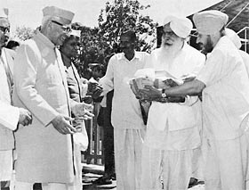 Mr. G.S. Pathak, Vice-President of India accepts a basket of fruit for his journey, 1973